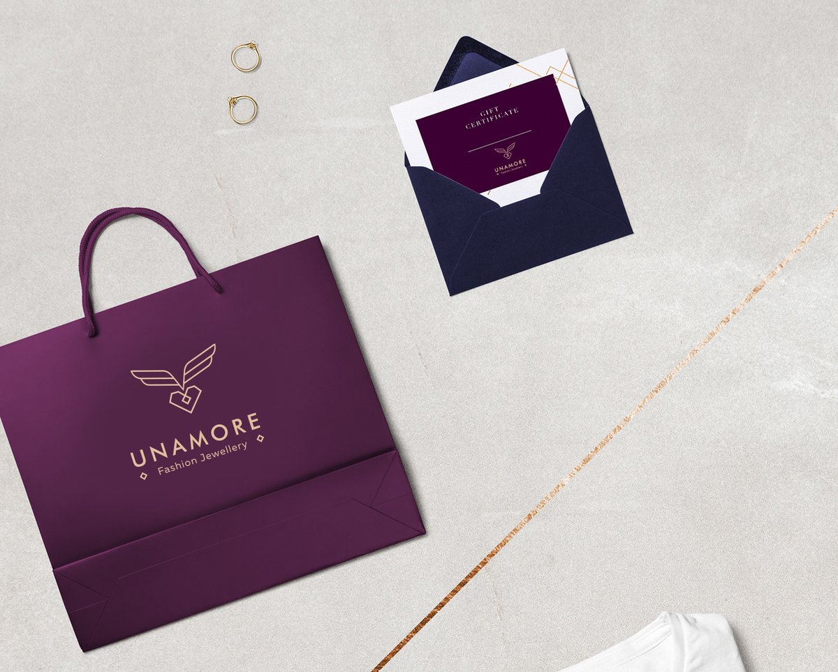 時尚珠寶首飾UNAMORE品牌設計和強化品牌“時尚”定位，時尚珠寶品牌設計，時尚品牌形象設計，品牌形象整合，珠寶品牌營銷，品牌戰(zhàn)略定位，品牌設計公司，品牌策劃公司，深圳品牌策劃，深圳品牌設計，左右格局